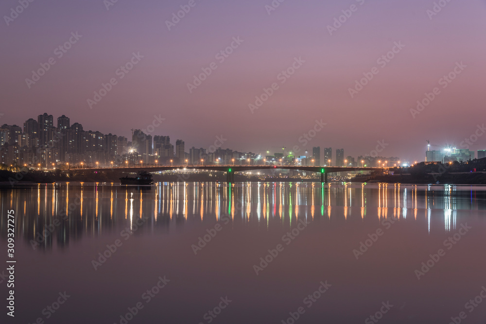 City river bank bridge at night