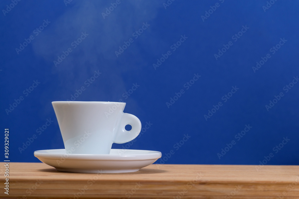 black coffee in a coffee cup from above isolated on wooden background. with clipping path. - obrazy, fototapety, plakaty 