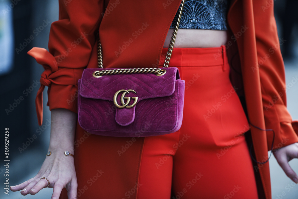 Milan, Italy - February 21, 2019: Street style – Gucci purse