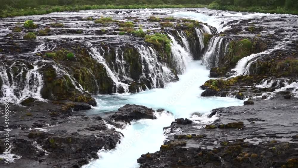 Bruarfoss Waterfall, Iceland. Beautiful and colorful waterfall in the golden circle in south Iceland Bruarfoss Waterfall, Iceland. Beautiful and colorful waterfall in the golden circle in south Iceland