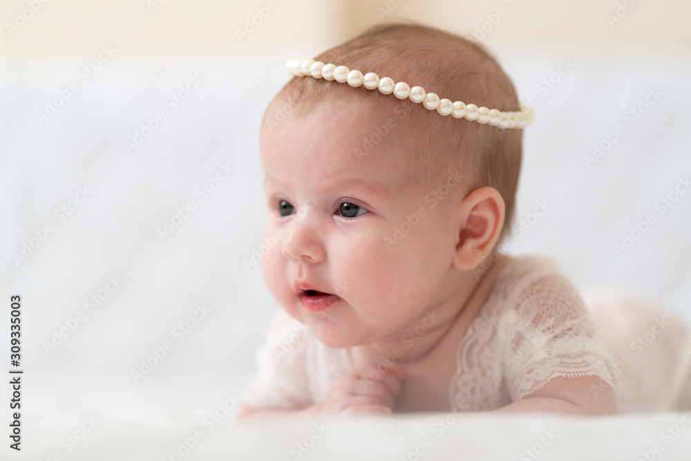 A baby Girl In Beautiful Lingerie In The Bedroom A baby Girl In Beautiful Lingerie In The Bedroom