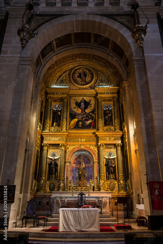Main altar and chancel at the Roman Catholic church Igreja de Sao Roque (Church of Saint Roch) in Lisbon, Portugal.