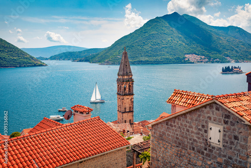 Not far from the famous city of Kotor is a small town of Perast. Splendid morning scene of Kotor Bay, Montenegro, Europe. Traveling concept background. Beautiful world of Mediterranean countries. photo