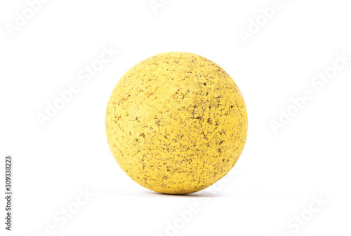 Old and dirty yellow rubber ball Isolated  toy for dogs