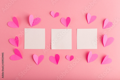 pink background with white blank form and hearts