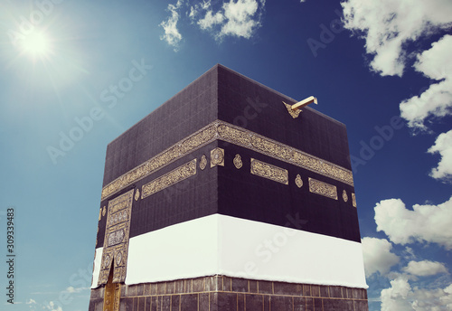 Kaaba with sky and sun