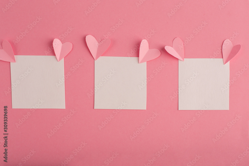 pink background with white blank form and hearts