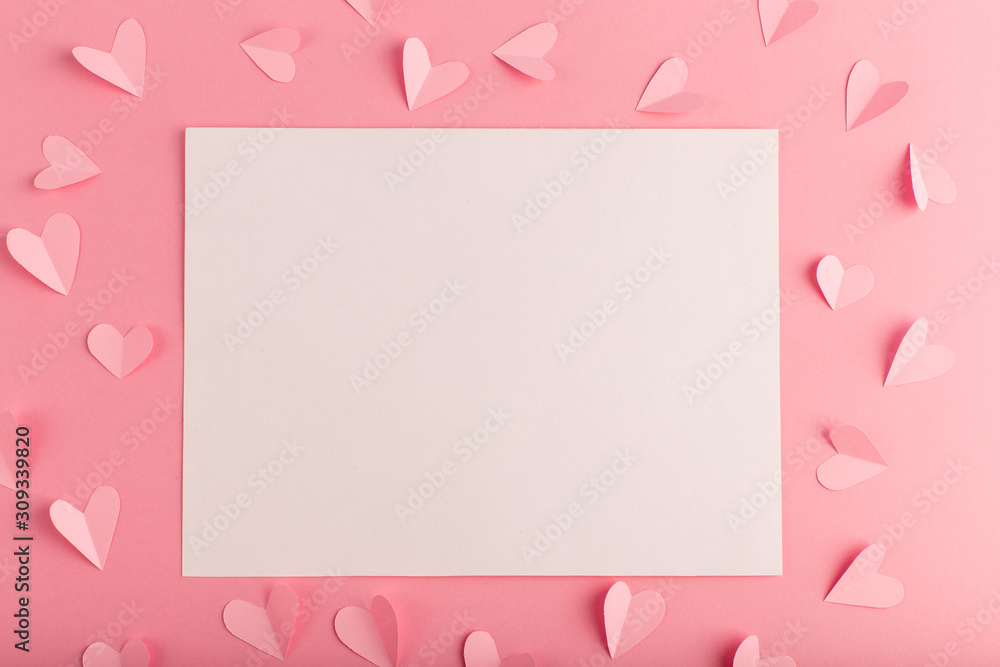 pink background with white sheet and hearts
