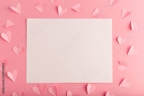 pink background with white sheet and hearts © Elena