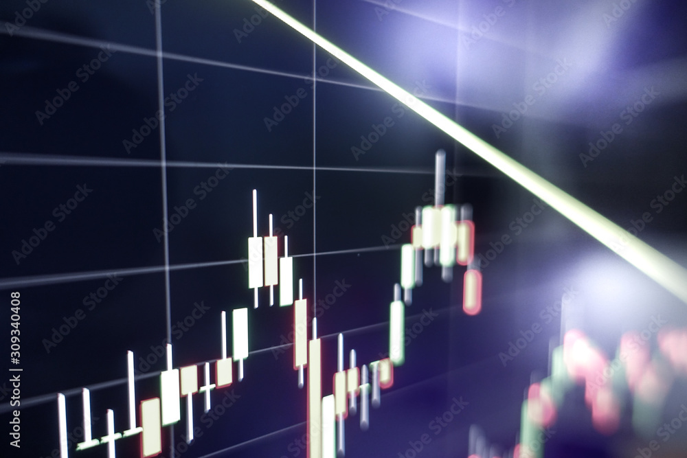 Stock market graph on laptop screen for business or economic concept. Stock market graph on laptop screen for business or economic concept.