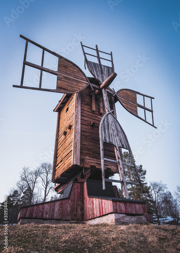 Old and abandoned windmill with beautiful sunset at evening in Finland