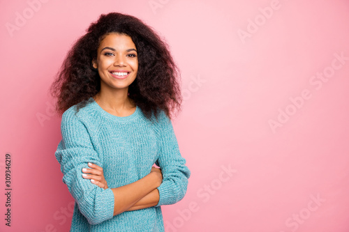 Close-up portrait of her she nice-looking attractive lovely charming pretty winsome trendy cheerful cheery content teen wavy-haired girl folded arms isolated over pink pastel color background photo