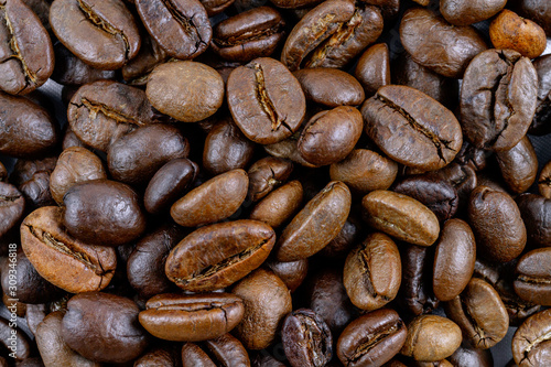 Roasted coffee beans closeup. Background texture.