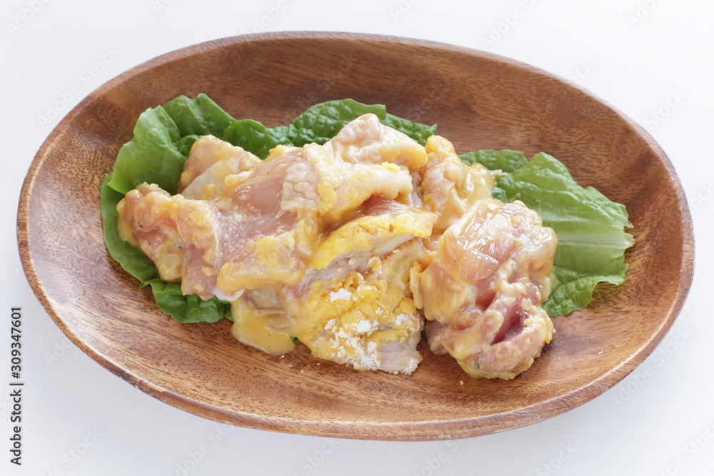 raw chicken and white background with copy space raw chicken and white background with copy space