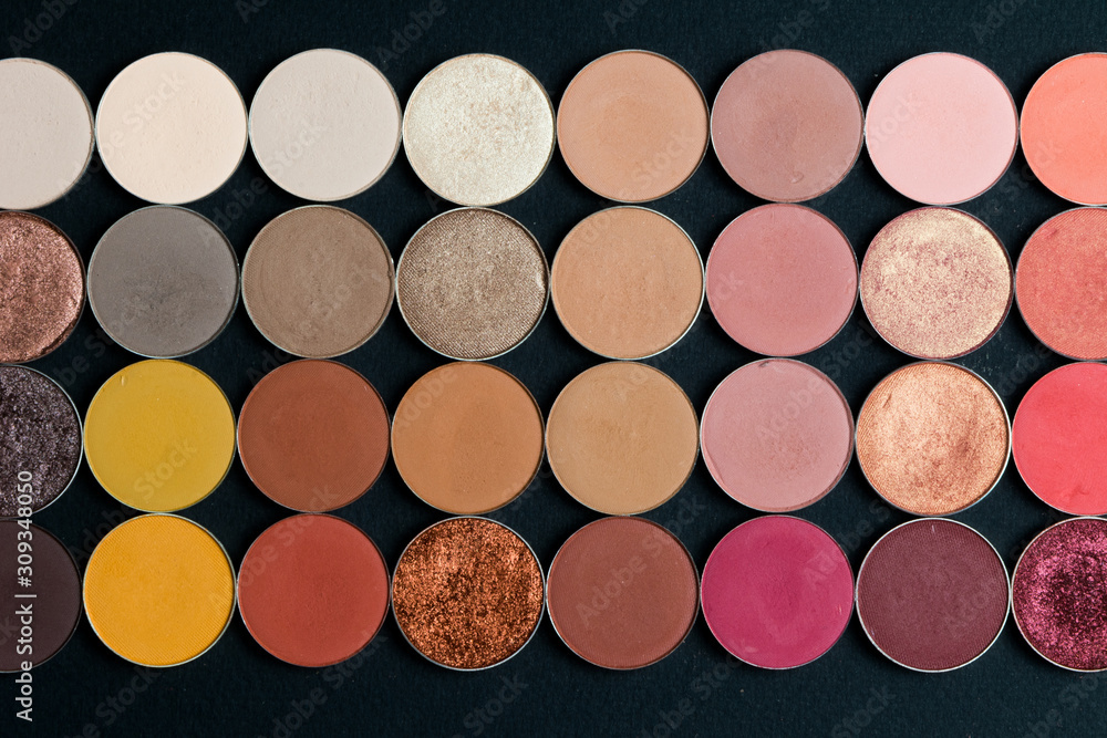 Make-up colorful eye shadow palettes isolated on black background. Make-up colorful eye shadow palettes isolated on black background.
