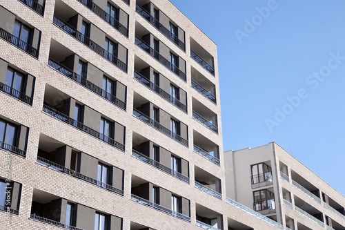 Modern and new apartment building. Multistoried modern, new and stylish living block of flats.