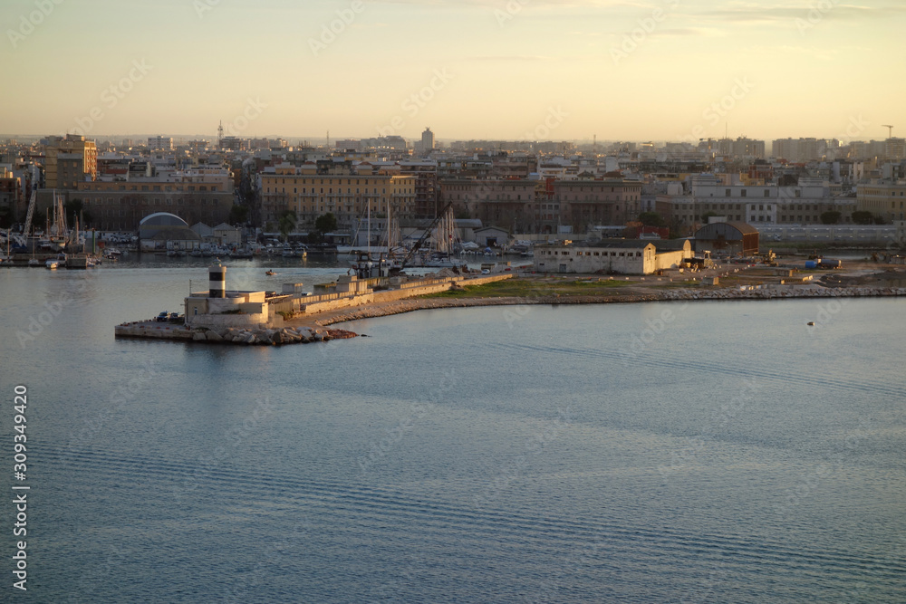 skyline of Bari from a ship at sunset