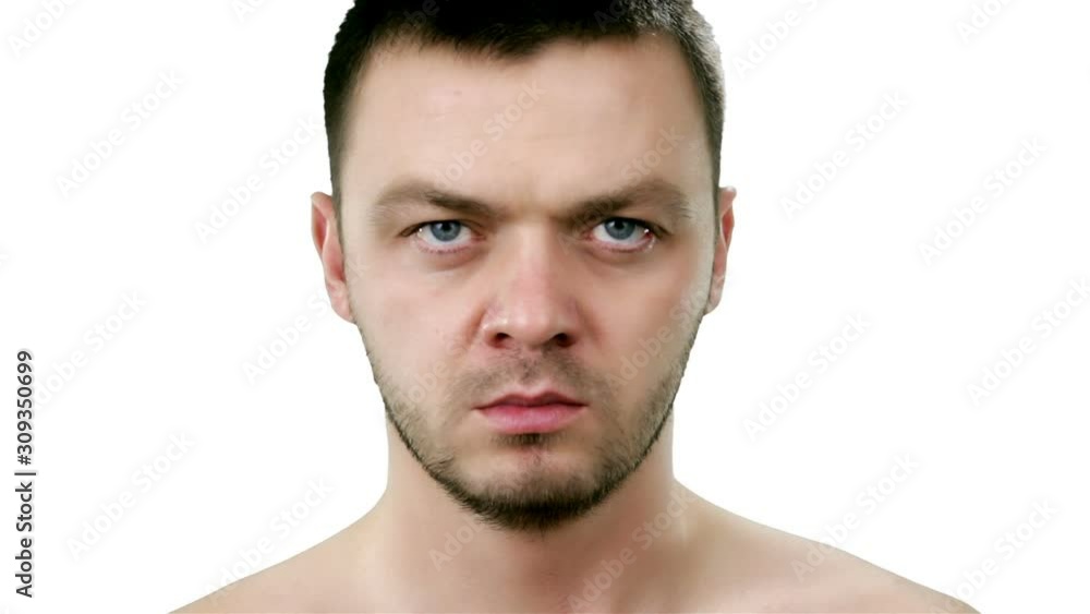 Young handsome man says no and nods his head on white background. Man showing refusal gesture no, shaking his head. It is not for me, leave me in piece, it is unacceptable. Young handsome man says no and nods his head on white background. Man showing refusal gesture no, shaking his head. It is not for me, leave me in piece, it is unacceptable.