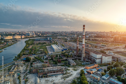 Inactive thermal power station located in the middle of a big city. Aerial view.
