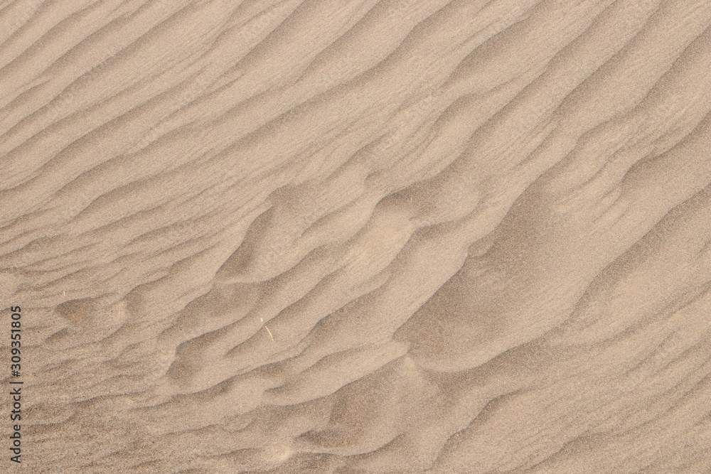 yellow desert sand dunes texture natural background.abstact sand wave pattern yellow desert sand dunes texture natural background.abstact sand wave pattern