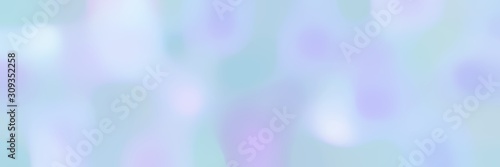 blurred horizontal background with light blue, lavender blue and lavender colors and space for text or image