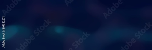 blurred bokeh horizontal background with very dark blue colors space for text or image