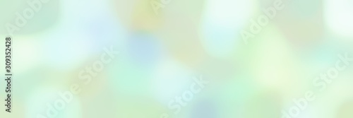 blurred horizontal background with tea green, light cyan and honeydew colors and free text space