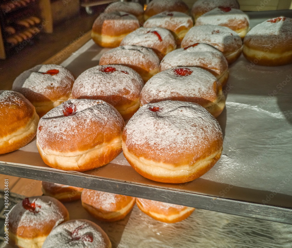 Festive appetizing donuts are sweet food attribute for Hanukkah Holiday
