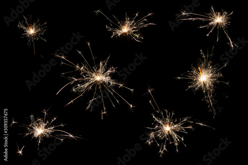 Set of images of sparklers on a black background