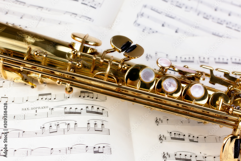 Obraz premium Soprano saxophone and musical notes
