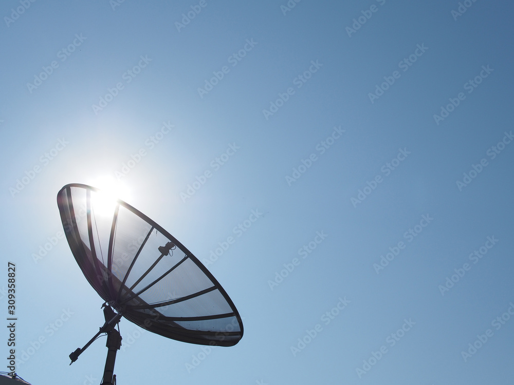 a old style satellite with blue sky