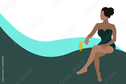 Girl in a swimsuit with a cocktail.