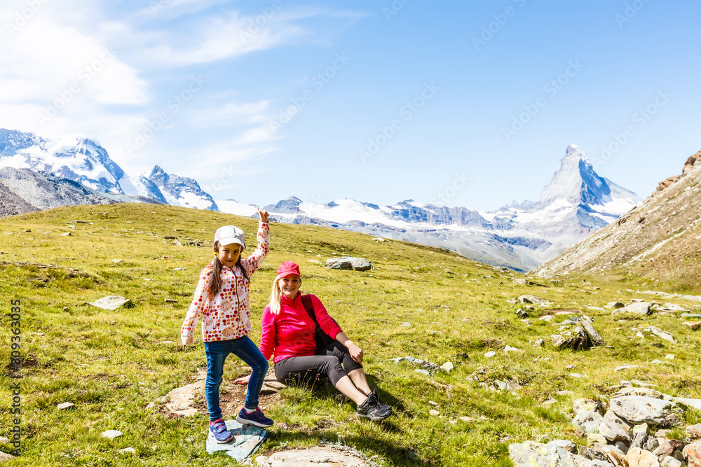 Fototapeta premium Family trekking, mother and daughter camping