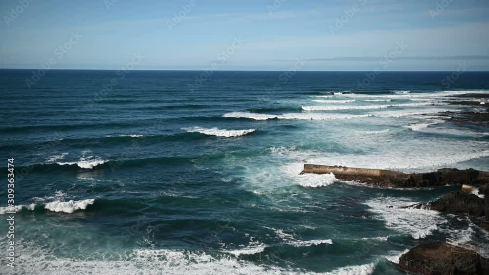 Waves on the rocky coast of Tenerife island, Canary islands, Atlantic ocean, Spain