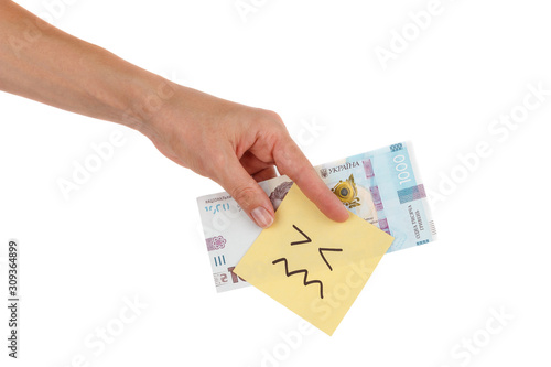 Thousand hryvnias and sticker with emoji, in the hand, isolated