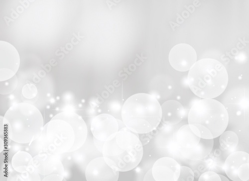 Gray abstract background. white bokeh and snowflakes blurred beautiful shiny lights. use for Merry Christmas /happy new year wallpaper backdrop and your product.
