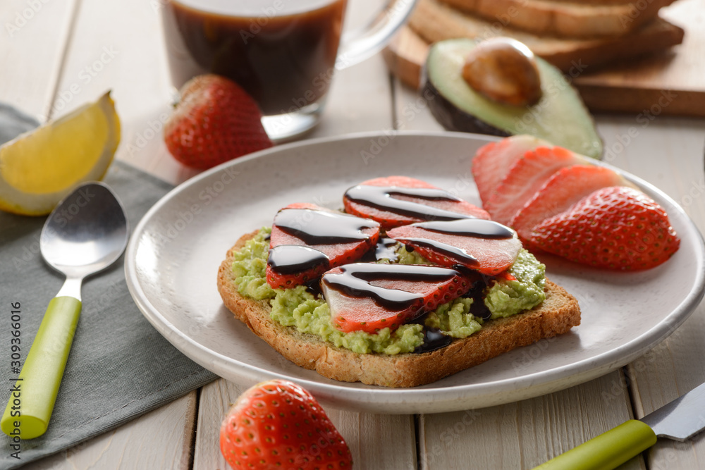 Tasty and healthy breakfast. Toast with mashed avocado Tasty and healthy breakfast. Toast with mashed avocado
