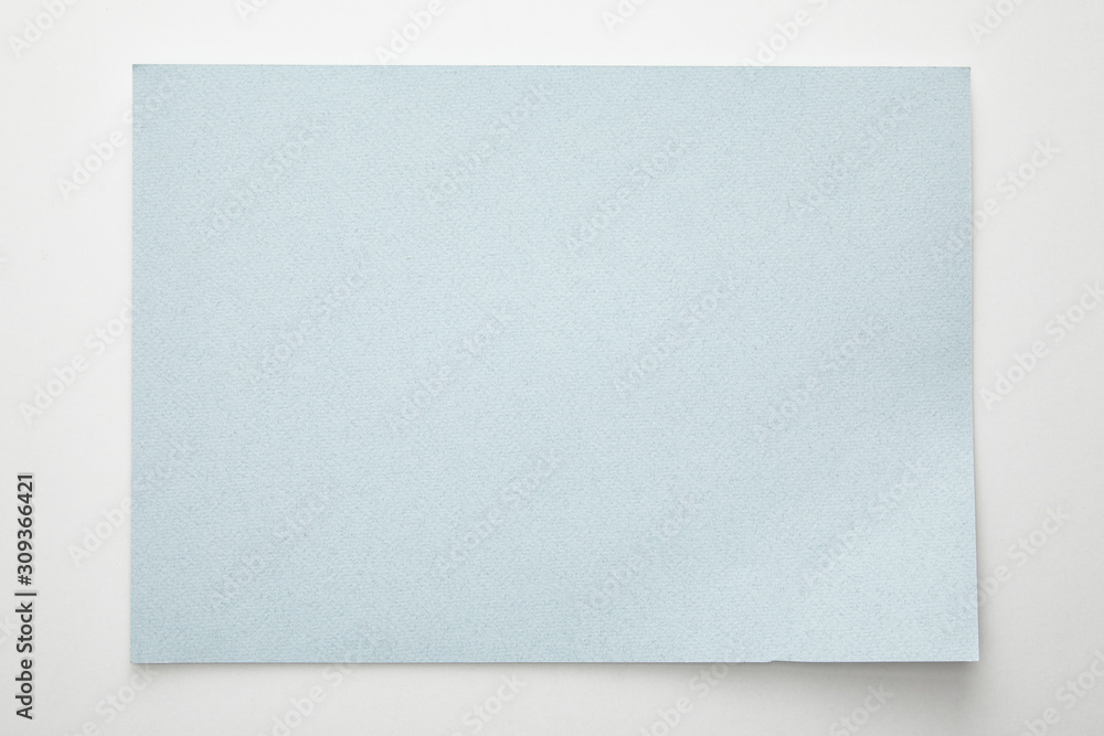top view of empty blue paper on white background top view of empty blue paper on white background