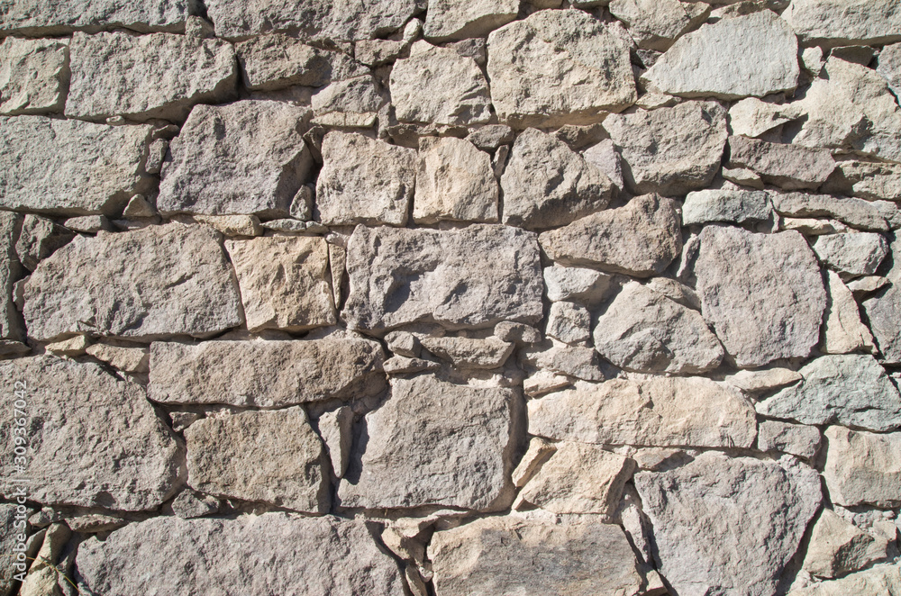 Old stone wall closeup Old stone wall closeup