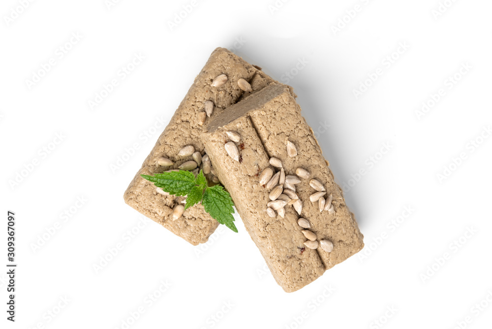 Sunflower halva isolated on white background. Sunflower halva isolated on white background.