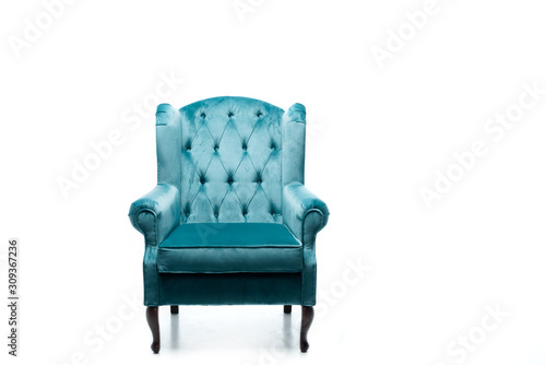 elegant velour blue armchair with pillow isolated on white