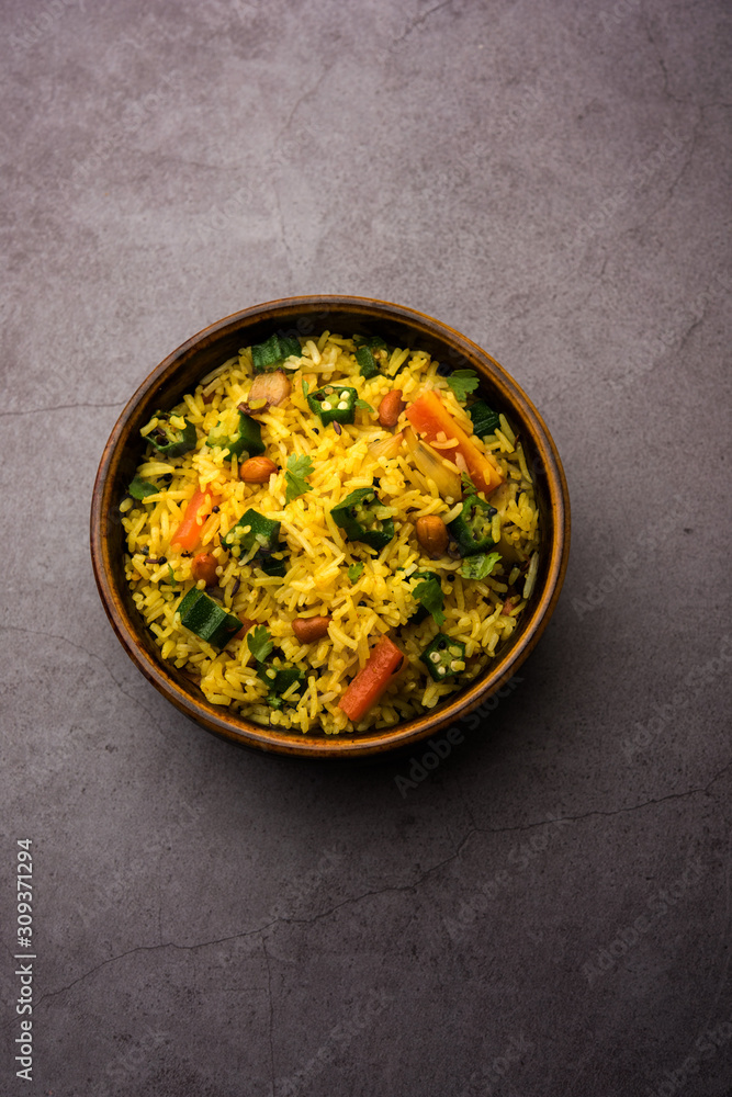 Okra or Bhindi rice also known as Vendakkai Sadam, served in a bowl, selective focus Okra or Bhindi rice also known as Vendakkai Sadam, served in a bowl, selective focus