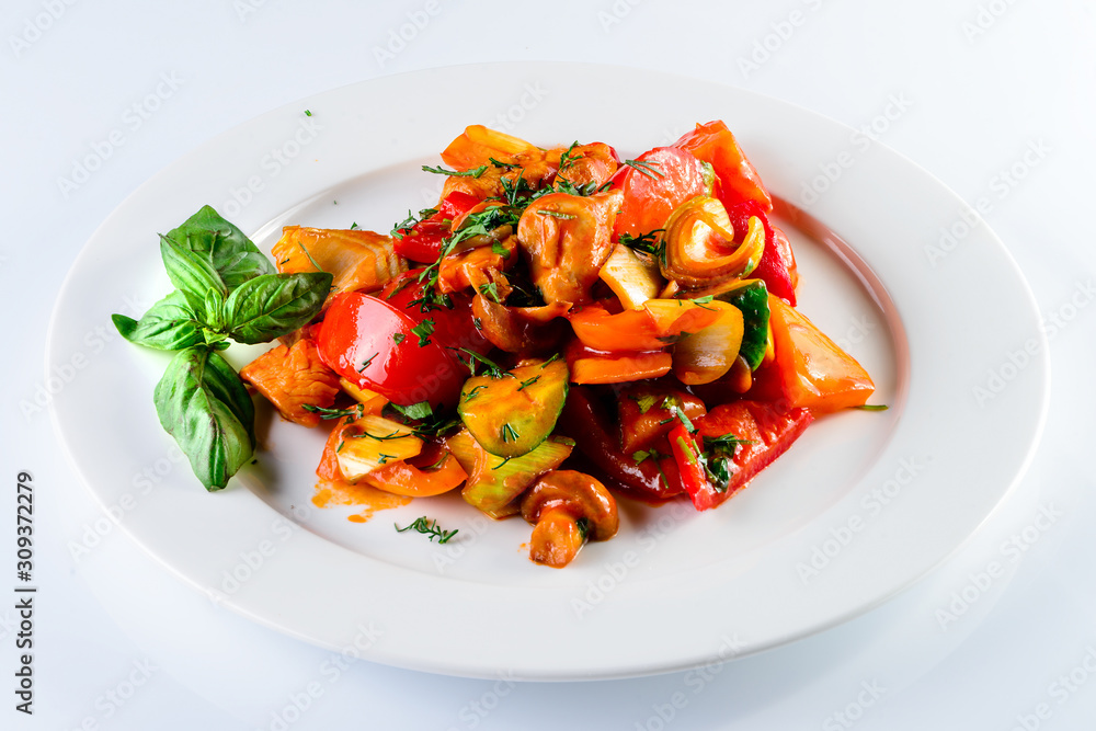 chicken fillet with vegetables on a white background chicken fillet with vegetables on a white background