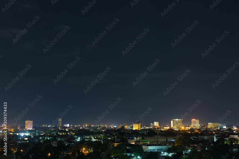 Fototapeta premium landscape city night with dramatic moody dark sky