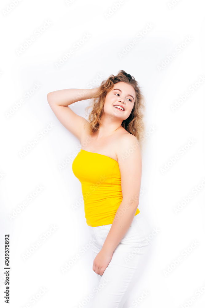 young pretty blond girl posing happy smiling on white background isolated, lifestyle people concept young pretty blond girl posing happy smiling on white background isolated, lifestyle people concept