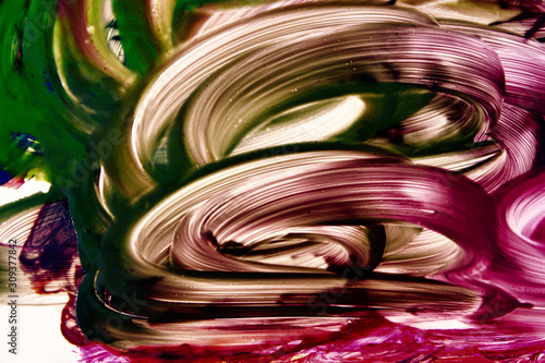 Abstract strokes of multicolored gouache on white paper for backgrounds