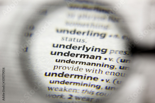 The word or phrase Underman in a dictionary. photo