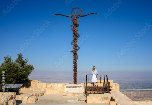 Serpentine Cross at the top of Mount Nebo in Jordan, place where Moses viewed the Holy Land