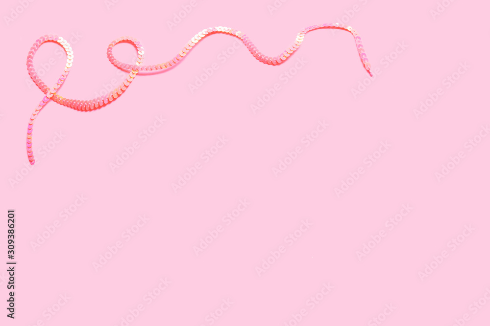 pink sequin strip frame on a pastel pink background