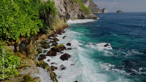 View of Peguyangan Waterfall, Nusa Penida, Bali, Indonesia photo